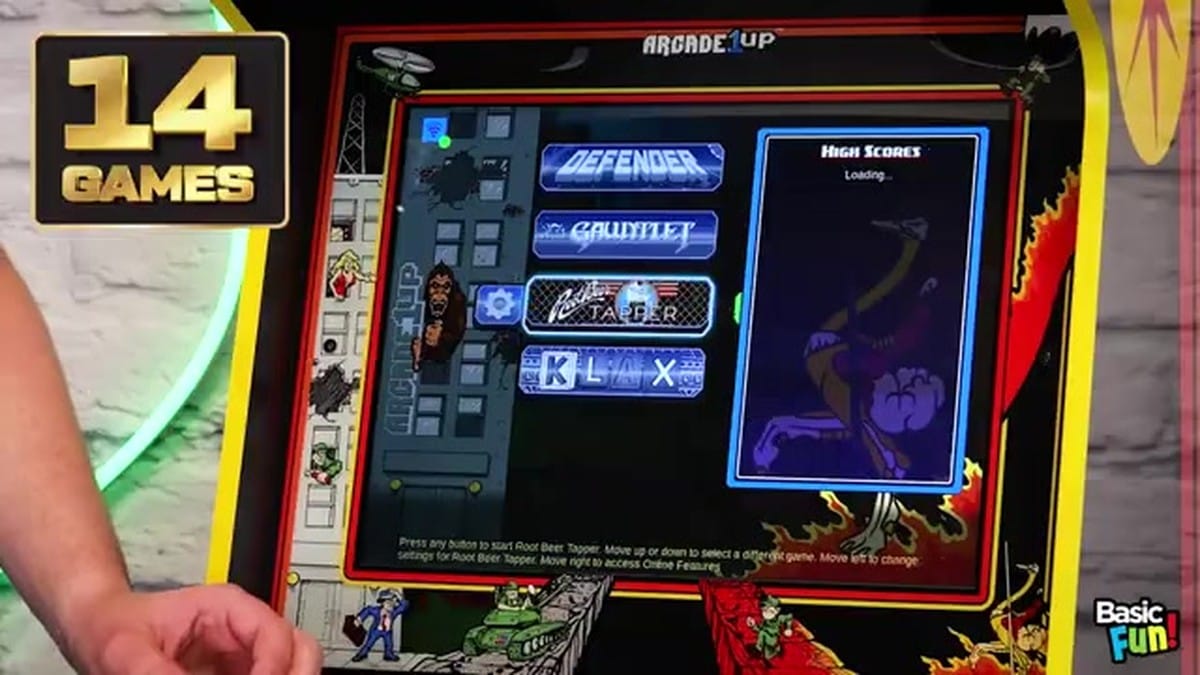 A close-up of the replica coin door with 'Free Play' light-up buttons.