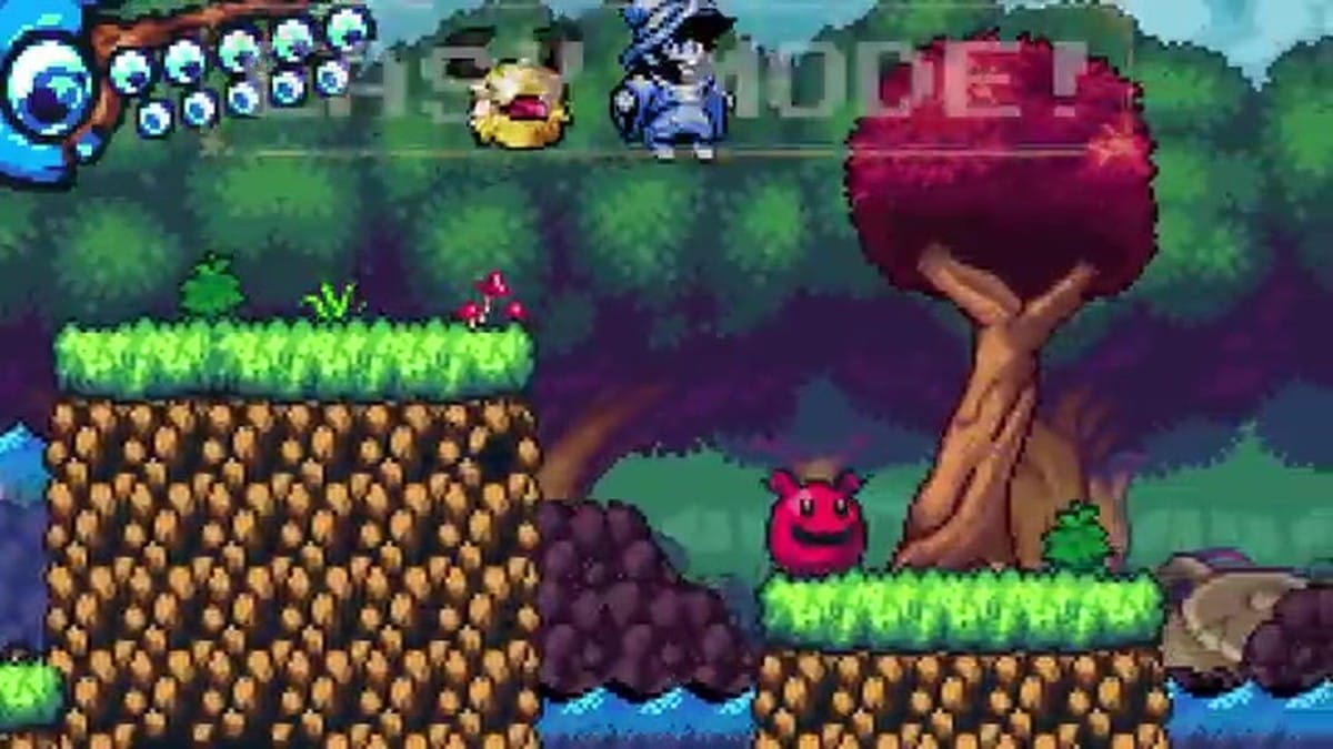 Text overlay announcing Easy Mode over gameplay of the character jumping on a red slime