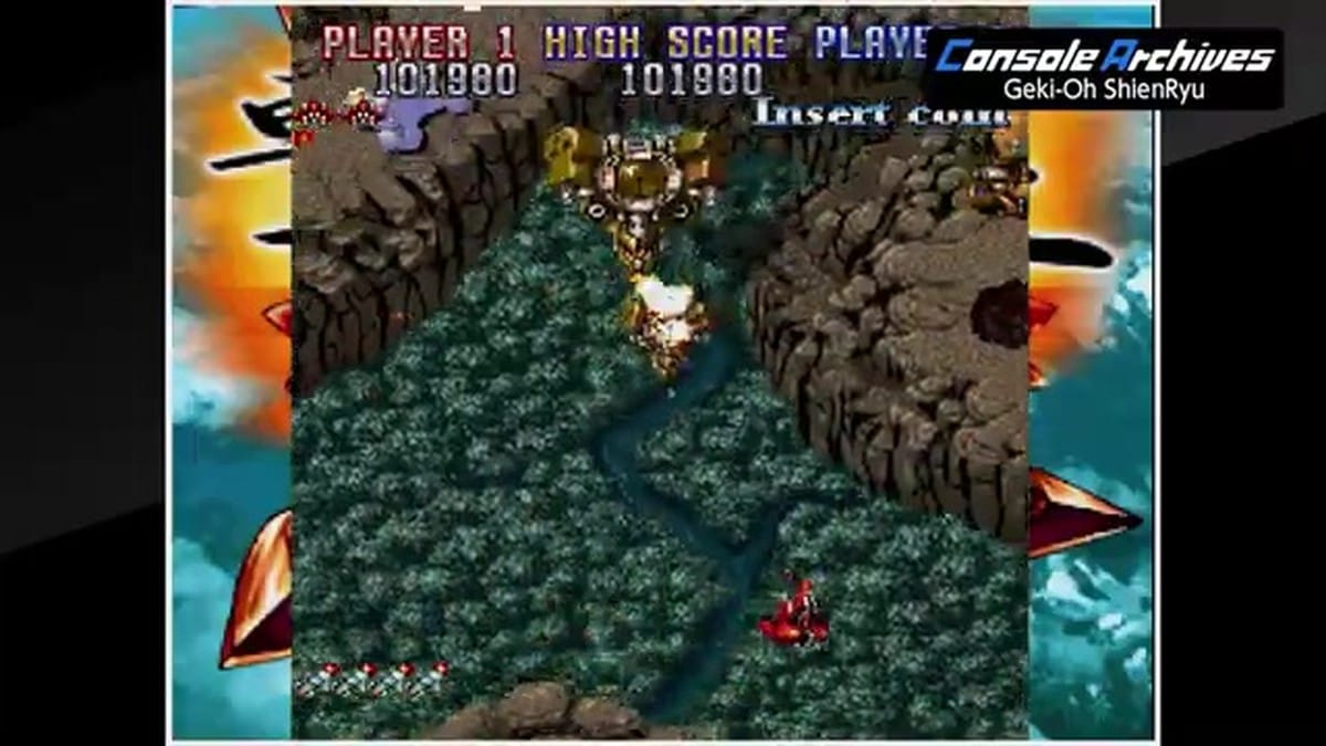 A boss encounter within a narrow canyon environment featuring complex bullet patterns.