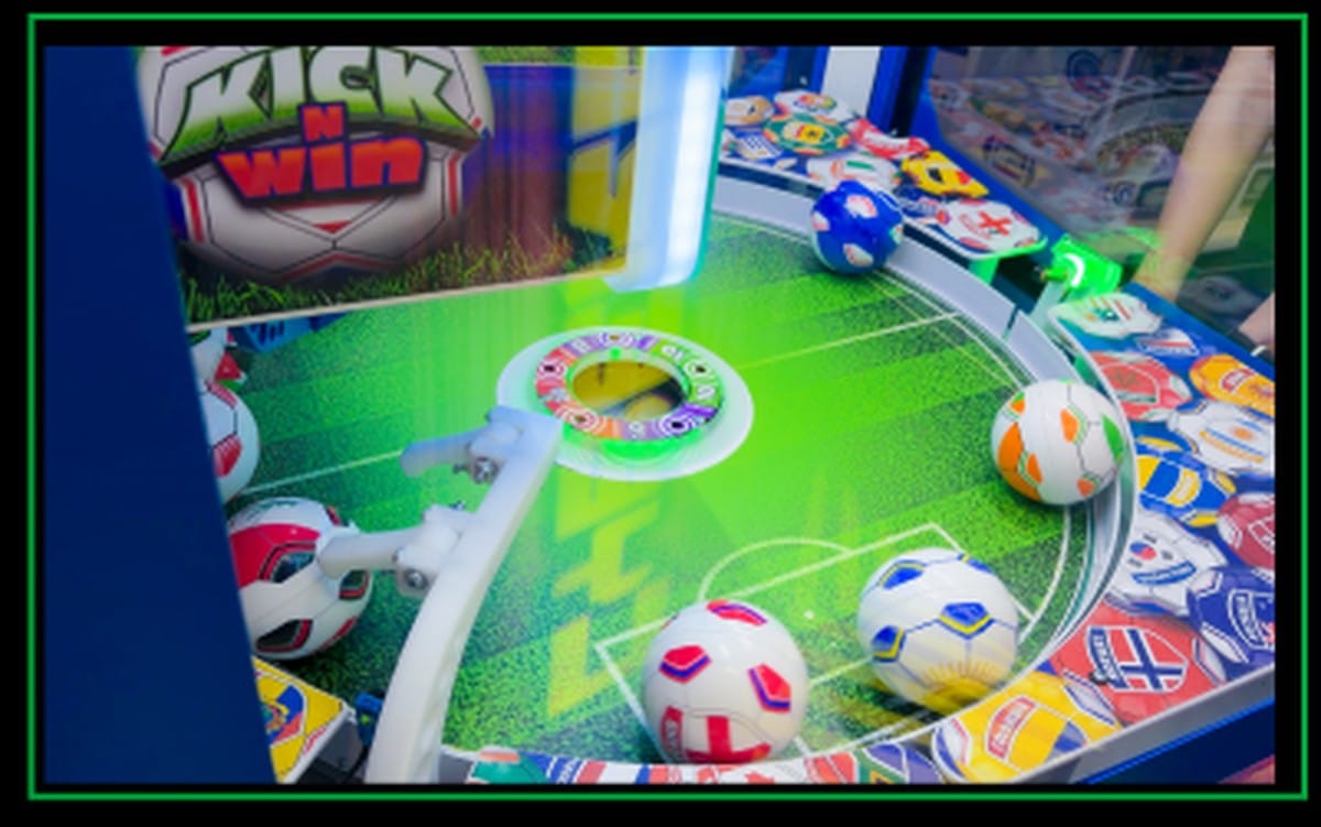 Kick N Win promotional art with a collection of the flag-themed balls