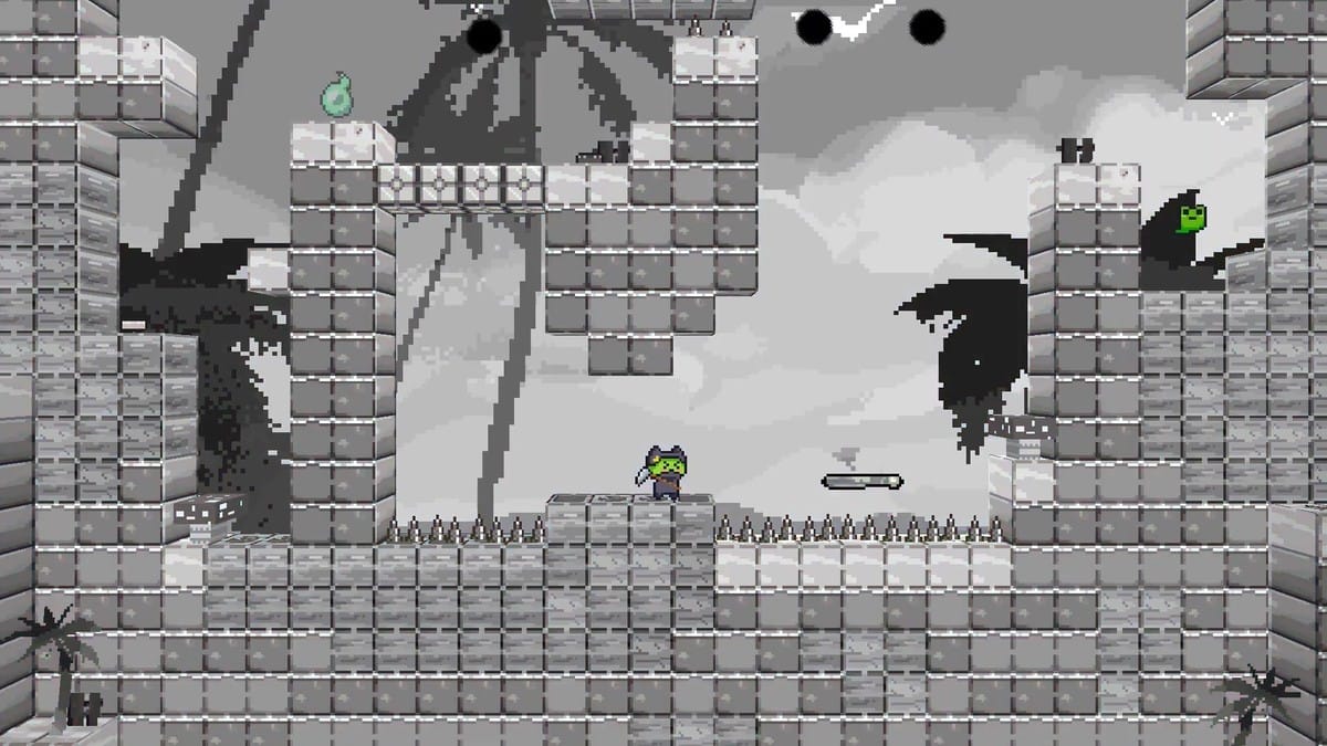 The screen turns grayscale as the player uses a time-manipulation ability to freeze hazards.