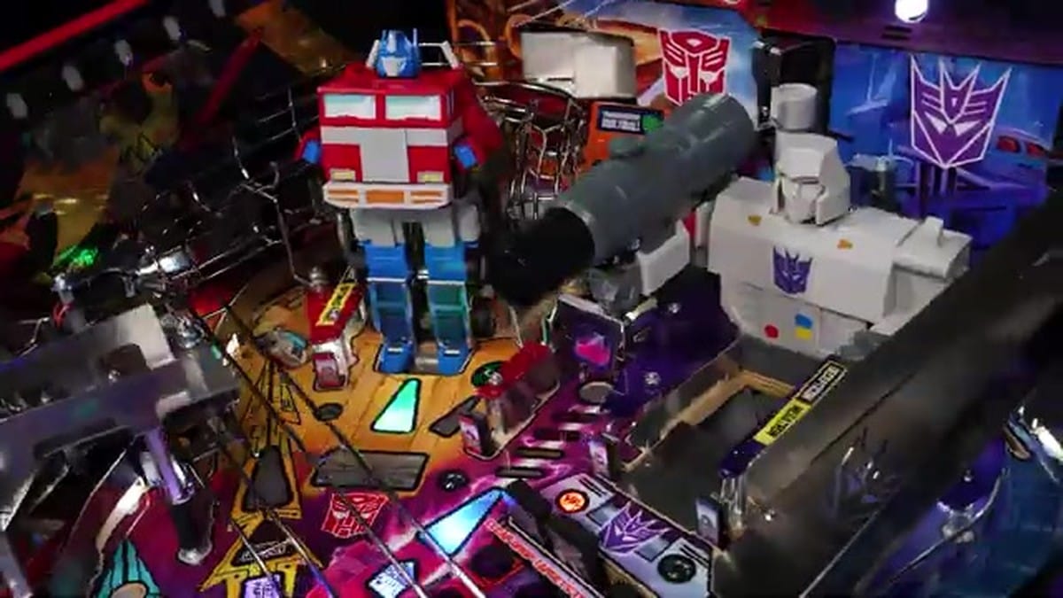 A high-detail shot of the modern John Wick pinball playfield with complex lighting and mechanics.