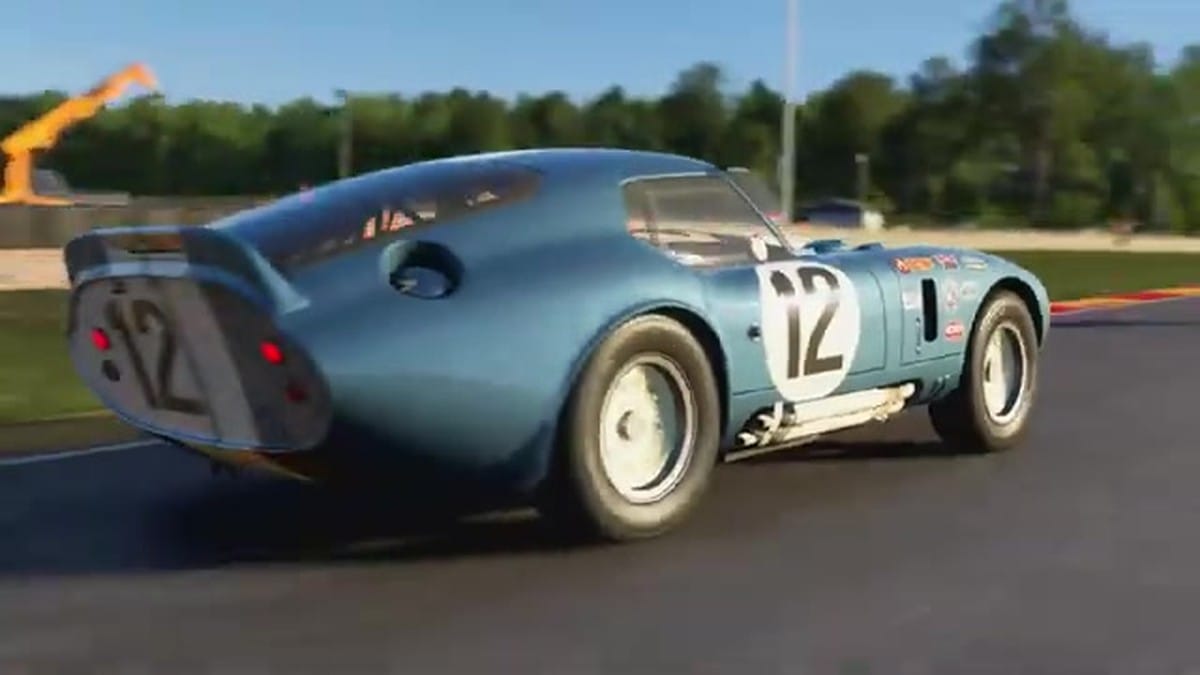 The Shelby Daytona Coupe speeding through a scenic section of the new Rocky Knoll Raceway.