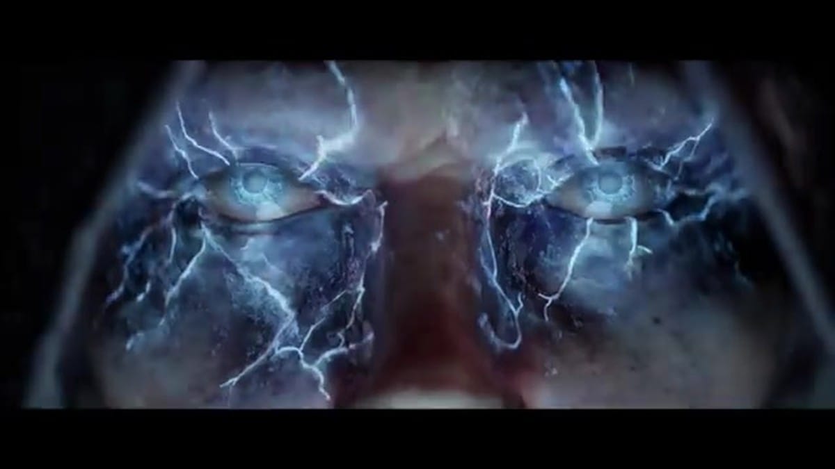 A dramatic close-up of Styx's face as blue magical energy surges through his eyes and skin.