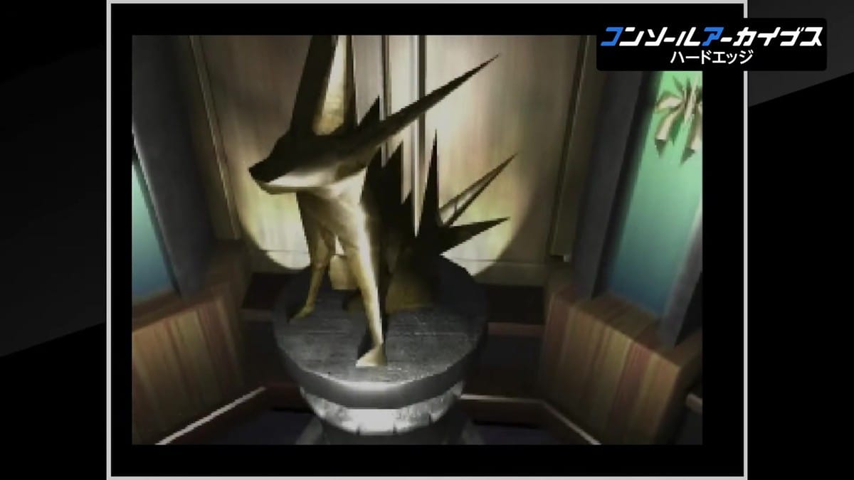 A close-up of a golden fox statue being rotated as part of a puzzle.