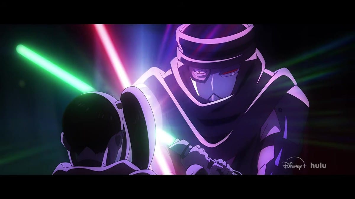 A close-up of Kara's face illuminated by the glow of her green lightsaber.