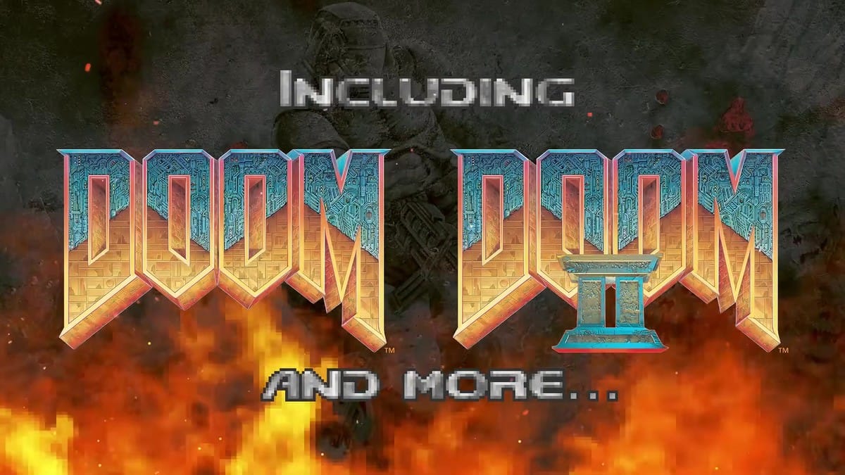 Hand inserting the red DOOM Collection physical cartridge into an Evercade handheld console.