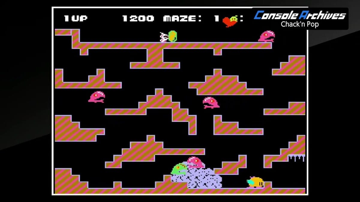Chack eliminates emerging Monsta enemies using smoke from rolling bombs while collecting bonus fruit.