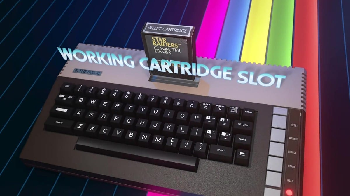Star Raiders cartridge inserted into the top-loading slot with on-screen text 'WORKING CARTRIDGE SLOT'.