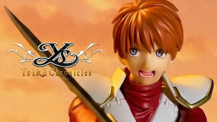 Promotional image of the Adol Christin Revoltech figure showing the character in silver armor with red hair.