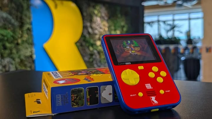 The Super Pocket Rare Edition handheld sitting on a wooden surface