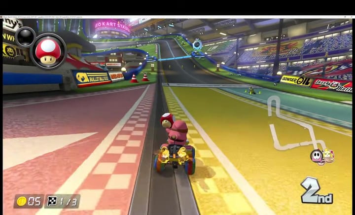 Pink Shy Guy racing in Mario Kart Stadium on 200cc during Lap 1