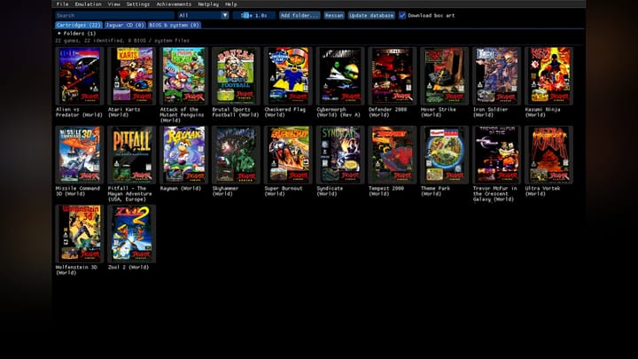 The Virtual Jaguar standalone desktop app game library featuring a grid of Atari Jaguar box art tiles